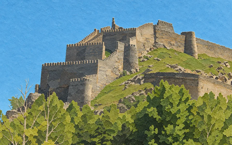 Murailles et tours en pierre de la forteresse de Gori au-dessus des arbres.